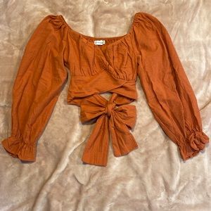 Long sleeve cropped orange top